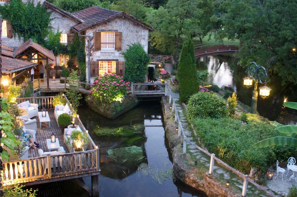 Le Moulin Du Roc Hotel บร็องโทม ภายนอก รูปภาพ